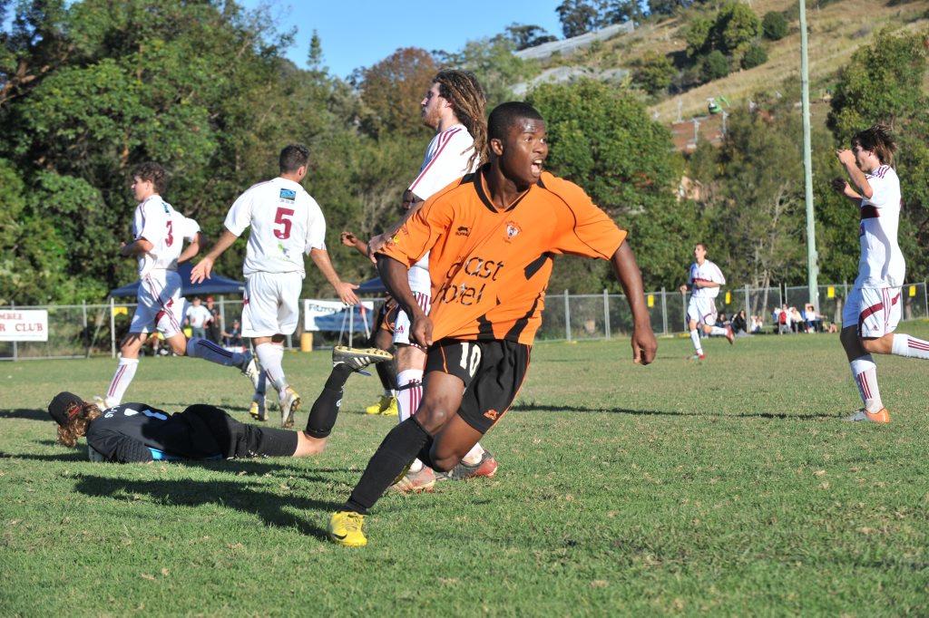Kodjo Adjassou celebrates scoring a goal for Coffs Coast Tigers. Photo: File Kodjo Adjassou celebrates scoring a goal for Coffs Coast Tigers. Photo: File